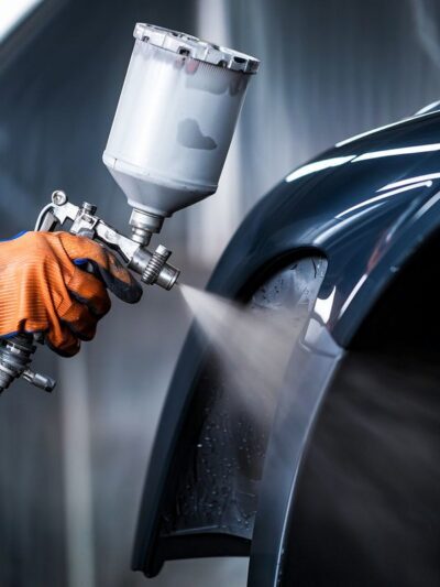 Auto body technician doing auto paint repair-RAM certified collision repair